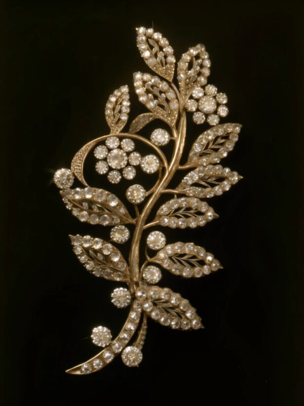 AI-generated vintage-inspired diamond brooch in a floral and leaf motif